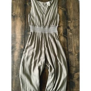 green jumpsuit